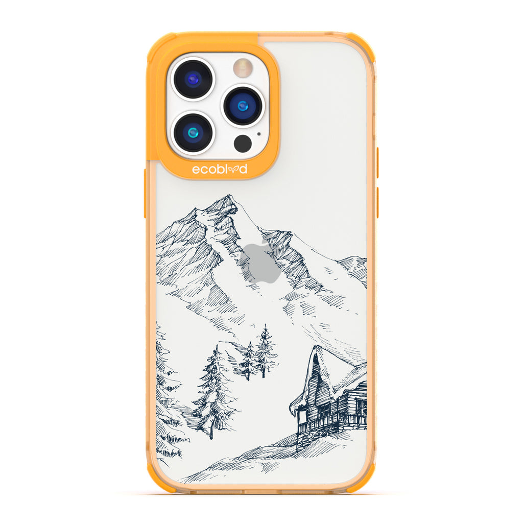 Winter Collection - Yellow Compostable iPhone 14 Pro Case - Snowy Mountainside Wood Cabin On A Clear Back
