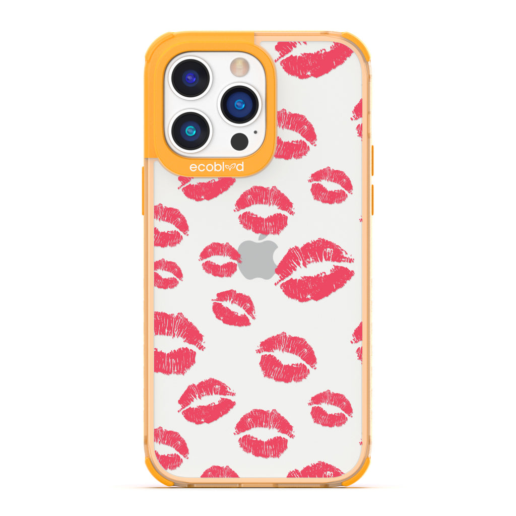 Bisou - Yellow Compostable iPhone 14 Pro Case - Multiple Red Lipstick Kisses On A Clear Back