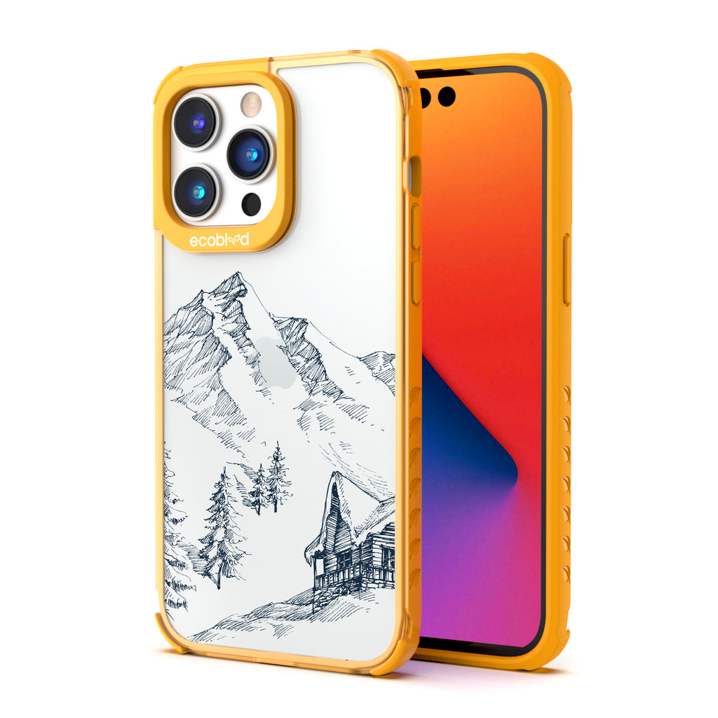 Winter Collection - Yellow Compostable iPhone 14 Pro Case - Snowy Mountainside Wood Cabin On A Clear Back
