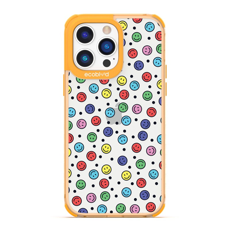 Laguna Collection - Yellow Eco-Friendly iPhone 14 Pro Case With Multicolored Smiley Faces & Black Dots On A Clear Back
