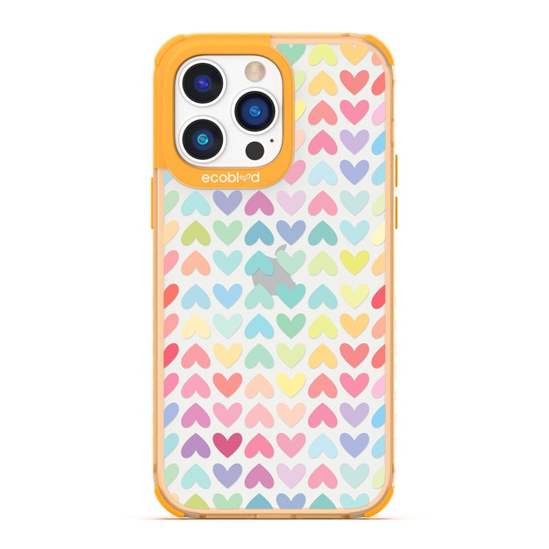 Laguna Collection - Yellow Eco-Friendly iPhone 14 Pro Case With A Pastel Rainbow Hearts Pattern On A Clear Back - Compostable