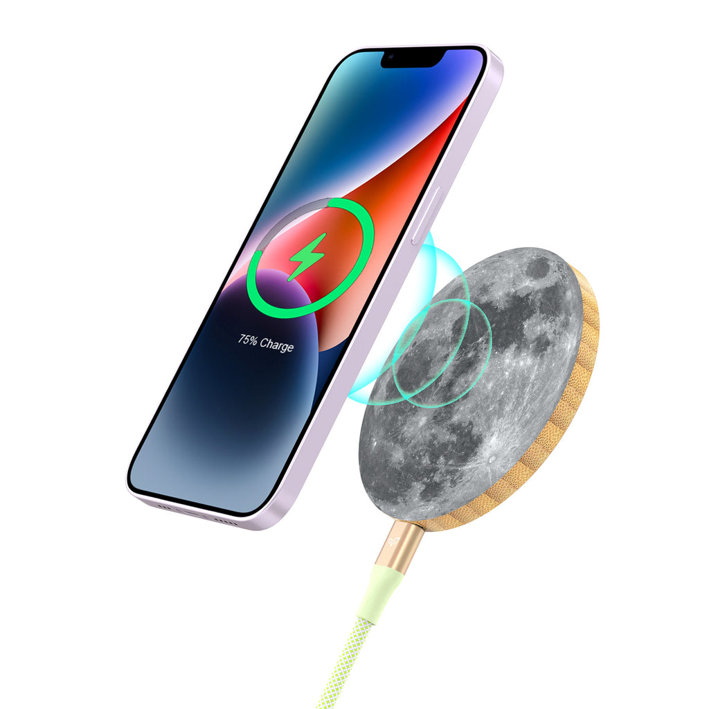 Moon Juice - An Eco-Friendly Bamboo Wireless Charger With The Moon Design Recharging An iPhone With 75% Charge On Screen